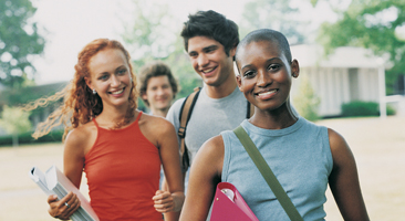 group of diverse young students walking