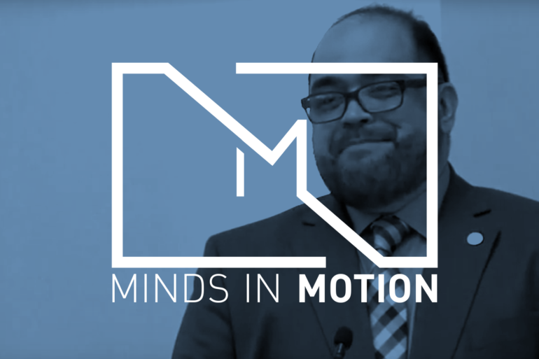 Edward teaching with minds over motion graphic overlay