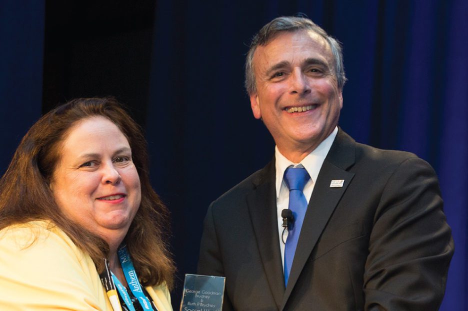 Kate Kahoney receiving an award