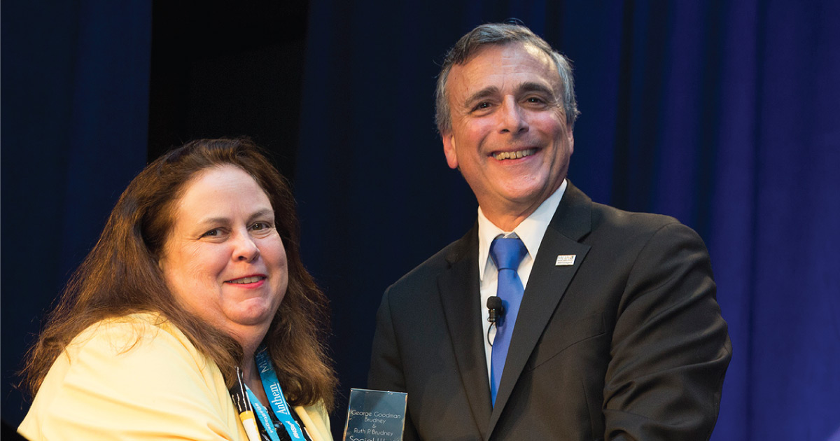 Kate Kahoney receiving an award