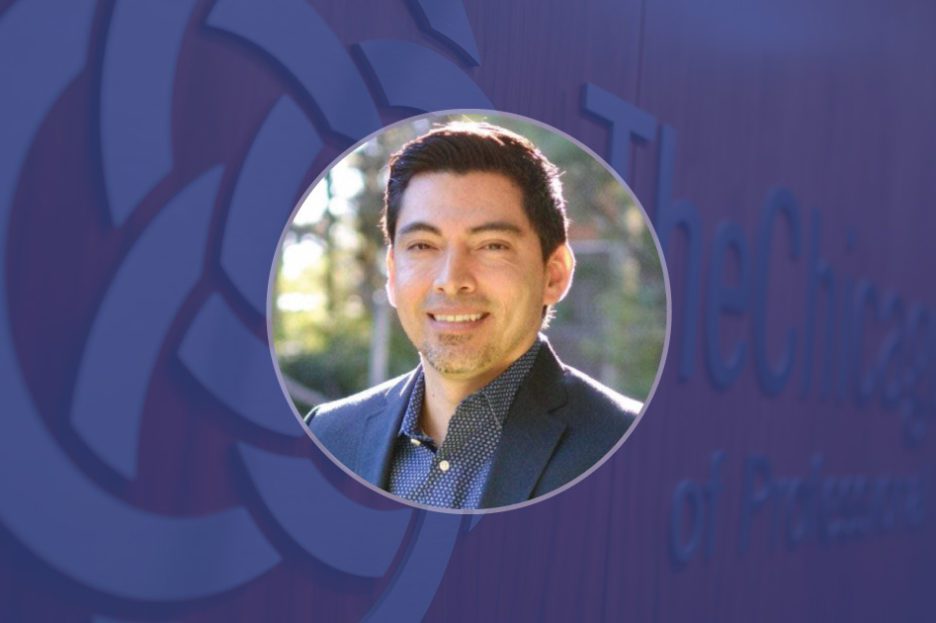 Formal photo of Efrain Talamantes in professional attire.