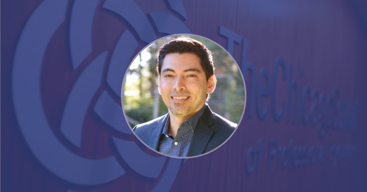Formal photo of Efrain Talamantes in professional attire.