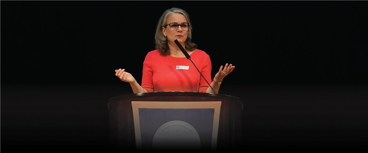 Image of Tracy Levine speaking at the 2022 NRCI conference, It’s Tough Enough: Adolescent Mental Health in Our Changing World.