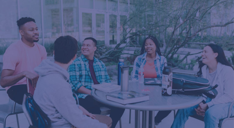 group of diverse people talking at a table
