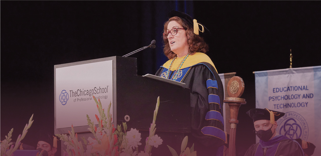 Photo of The Chicago School president, Michele Nealon, speaking at a commencement.