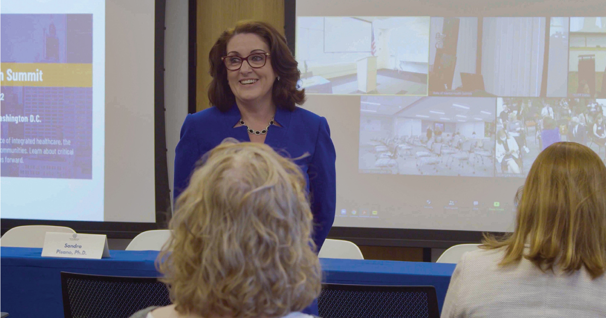 Image of The Chicago School President, Michele Nealon, Psy.D., speaking at the first State of Mental Health Summit.