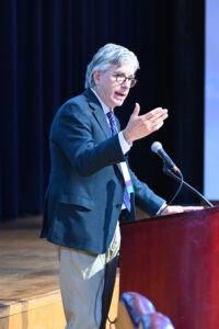 Dr. Reinecke at lectern