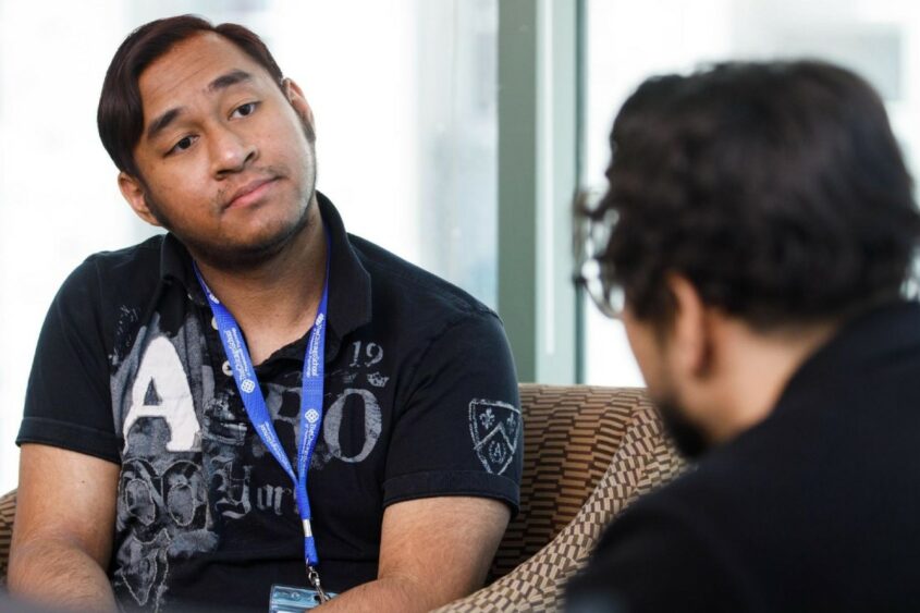 two people talking in a therapy session