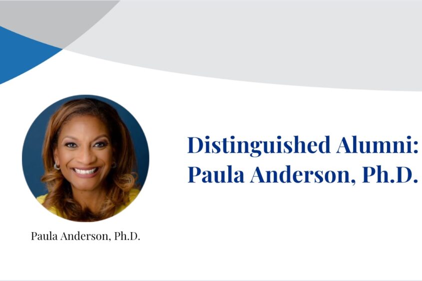 Dr. Paula Anderson smiles at the camera in photograph inset on a banner displaying their name.