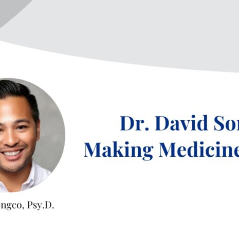 Dr. David Songco smiles at the camera in photograph inset on a banner displaying their name.
