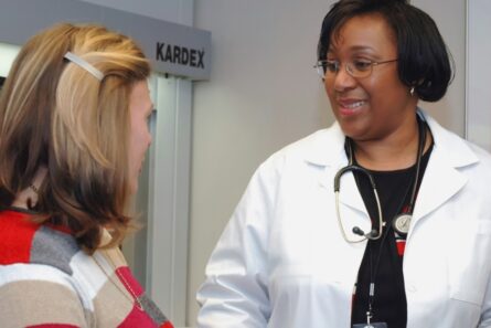 A female doctor speaking with a patient.