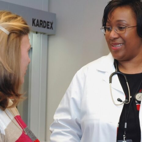 A female doctor speaking with a patient.