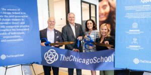 People attend a ceremony for The Chicago School's Dallas Campus.