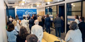 People attend a ceremony for The Chicago School's Dallas Campus.