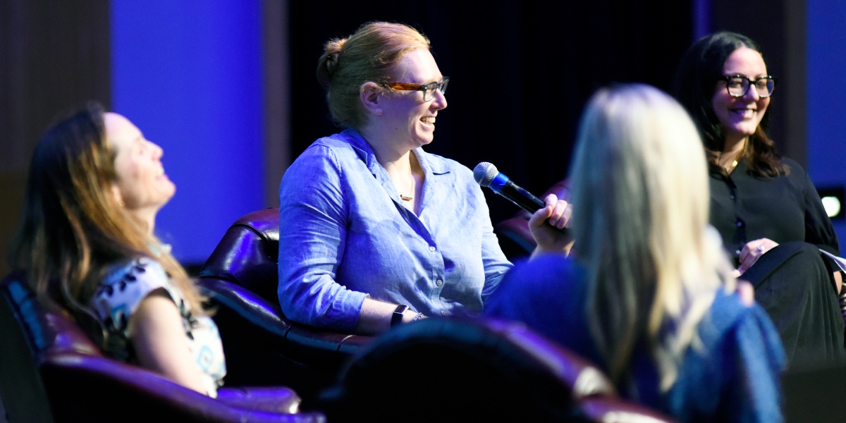 Attendees listen and smile at the NRCI's 24th Annual Community Mental Health Conference.