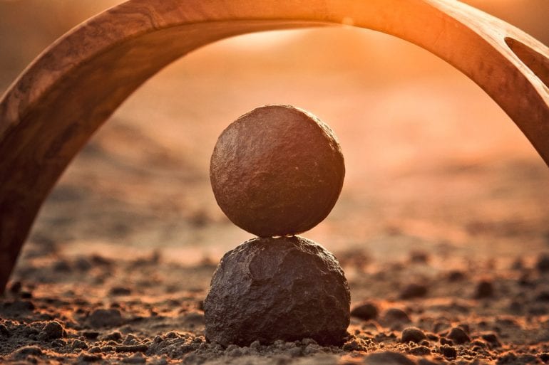 two spherical rocks stacked