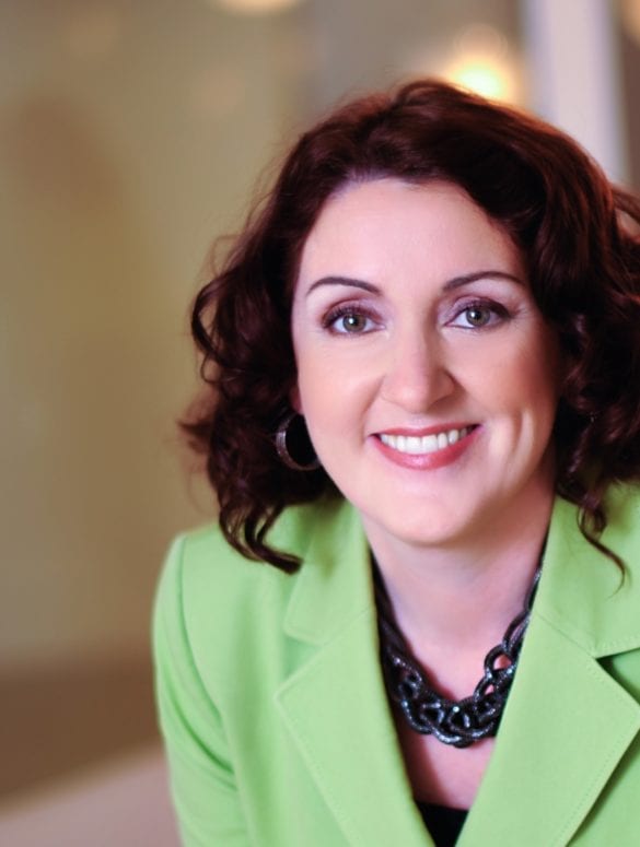 dr michele nealon in green business attire