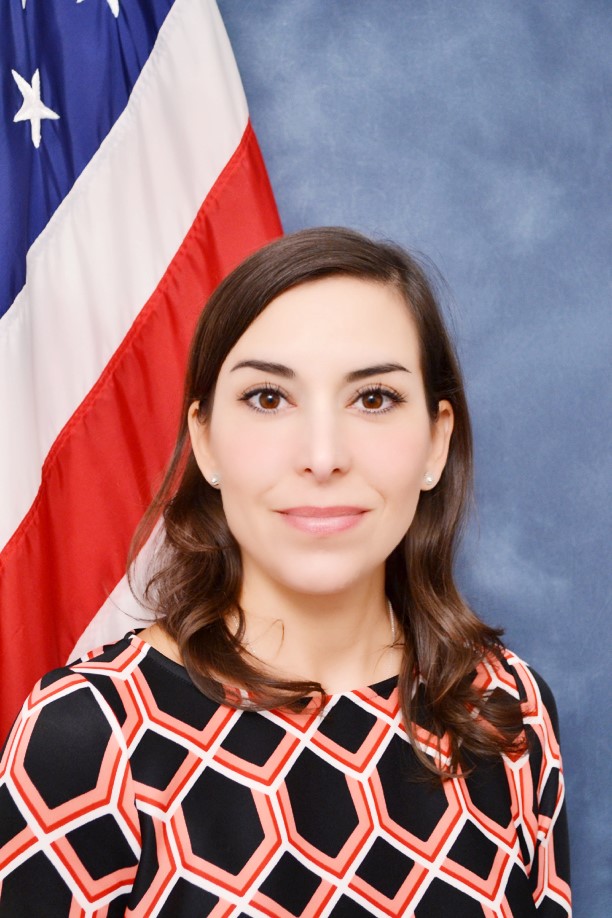 woman in front of american flag