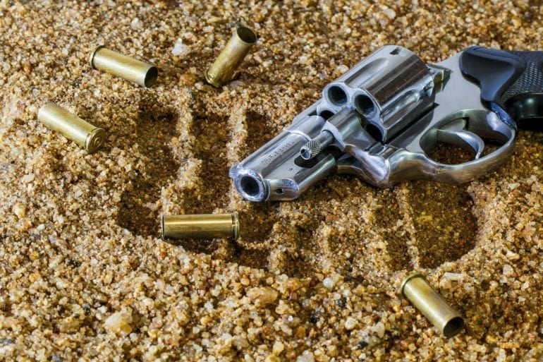 gun with shell casings