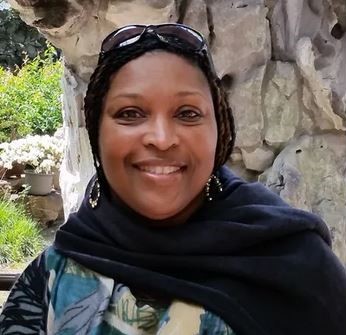 woman with sunglasses on her head