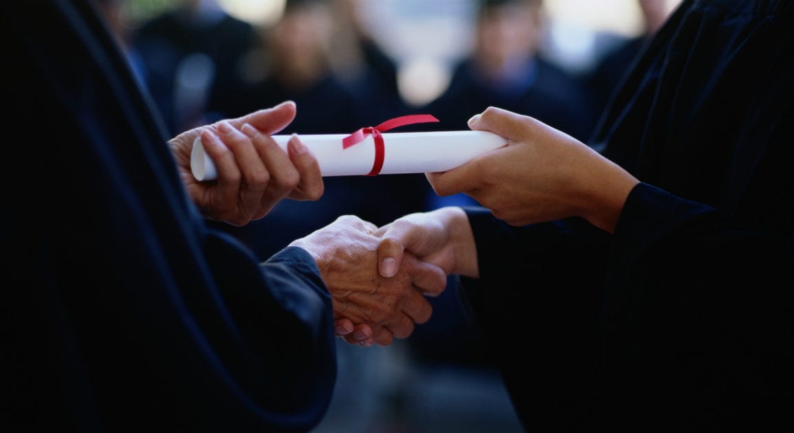 person receiving their diploma