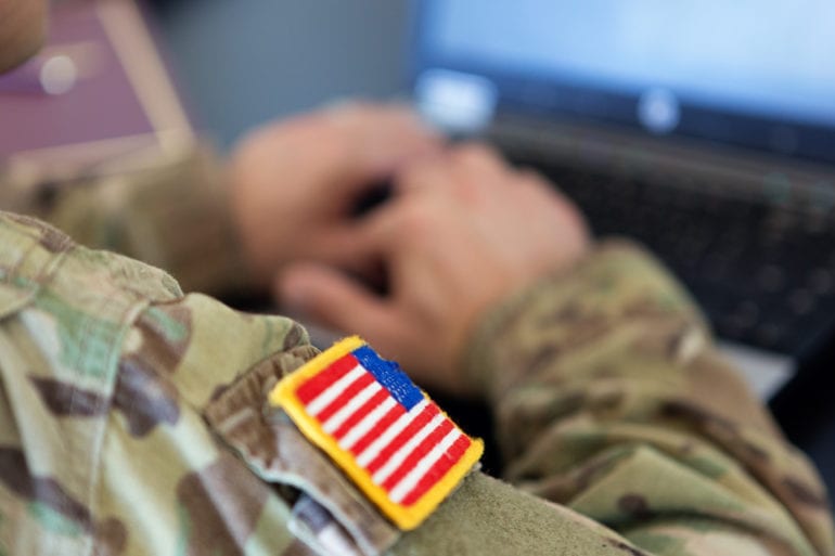american flag patch on military fatigues