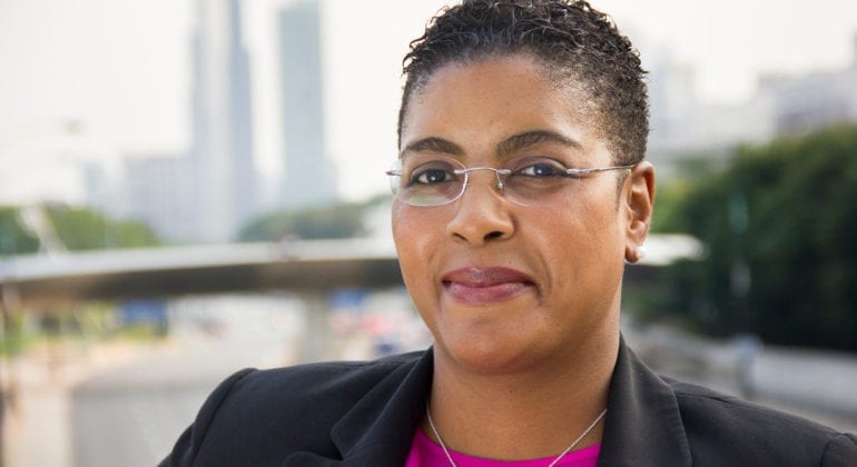 woman with small frame glasses