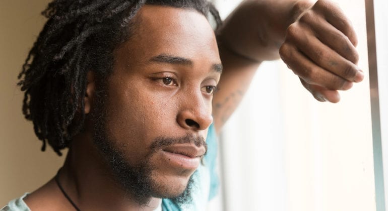 man looking distraught