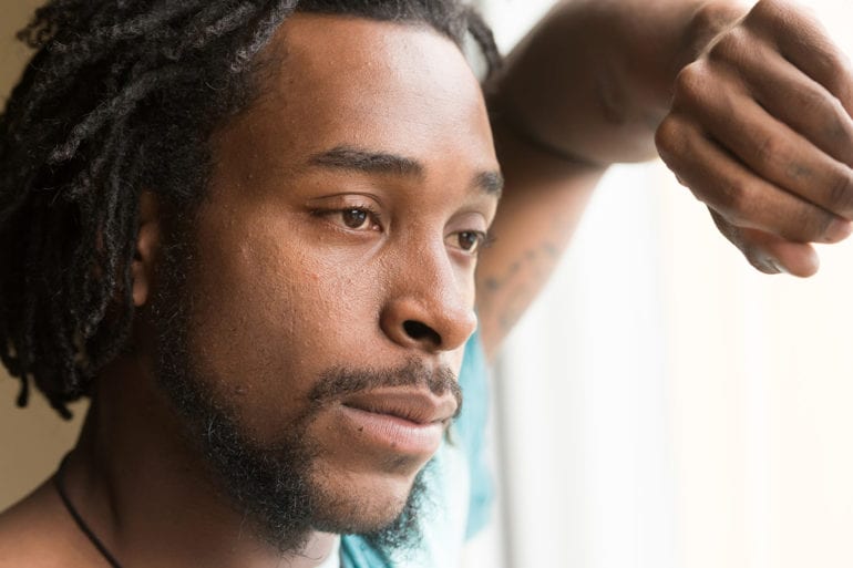 man looking distraught
