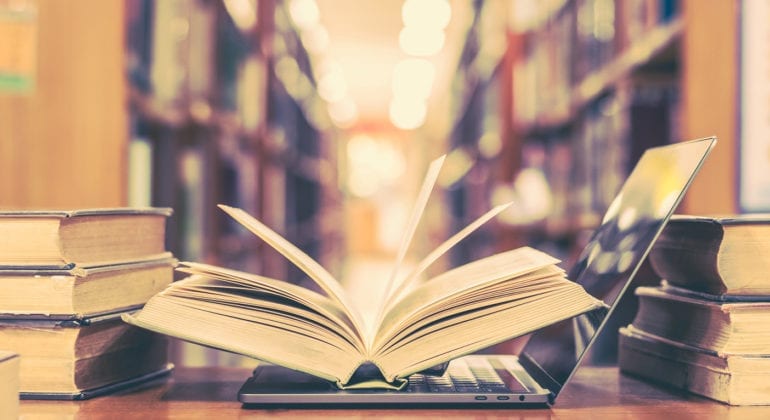 book open on laptop