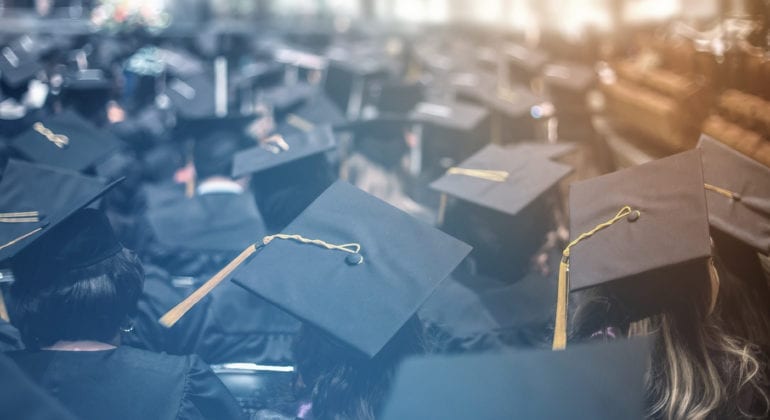 rear view of graduation caps