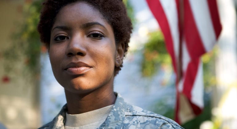 woman in military fatigues