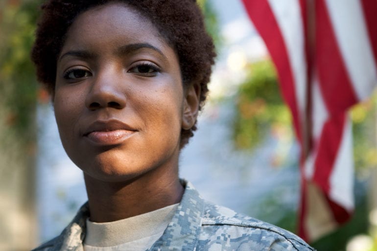 woman in military fatigues