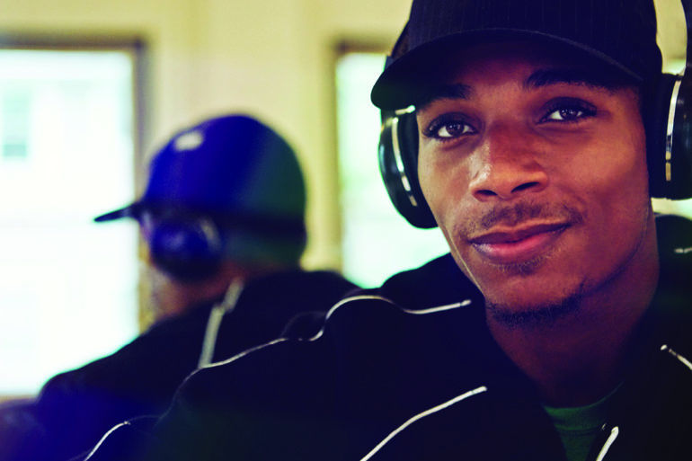 Rap and hip-hop therapy can help the mental health community, primarily ethnic minorities as featured in the image.