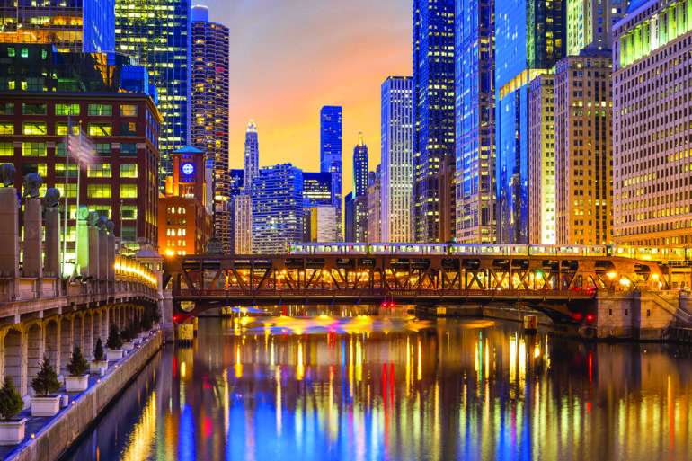 chicago river at night with lights on