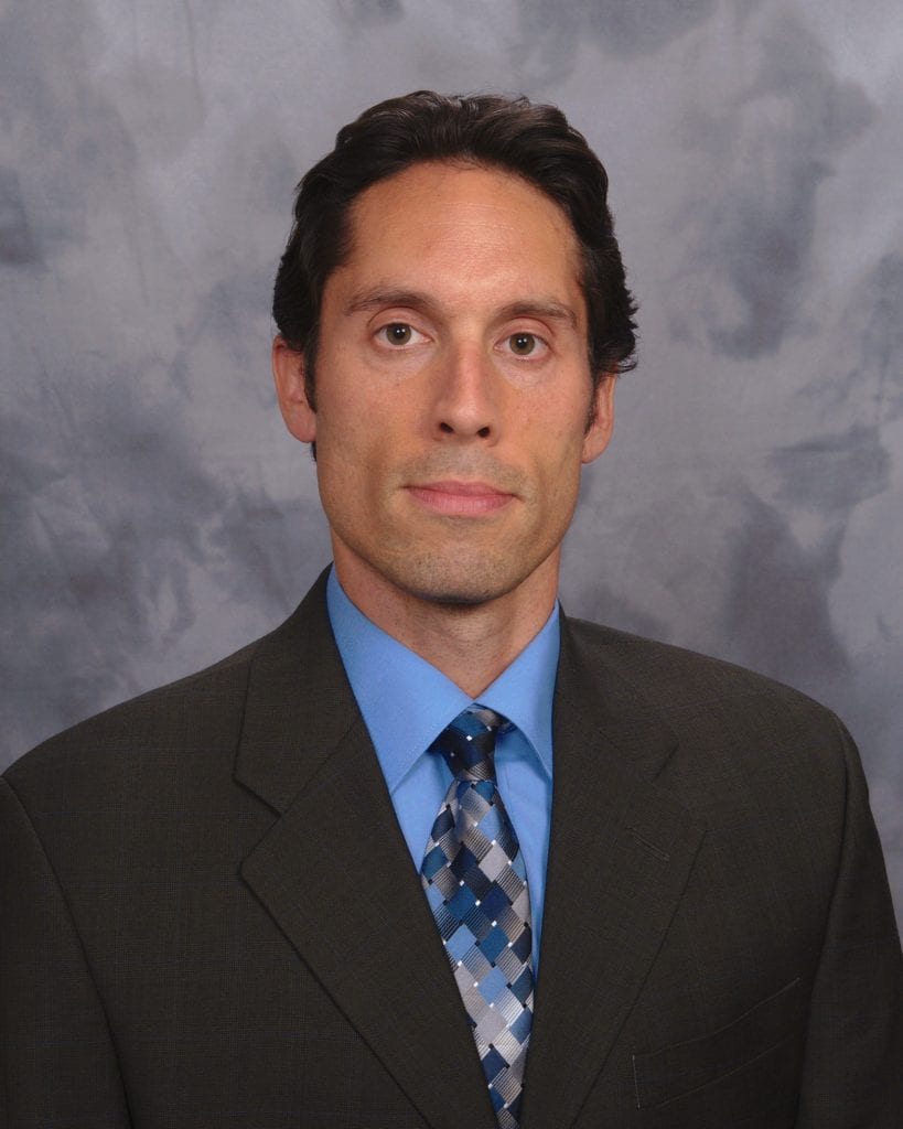 Dr. Gregory Benson-Flórez