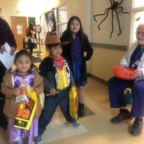 young kids dressed up for halloween