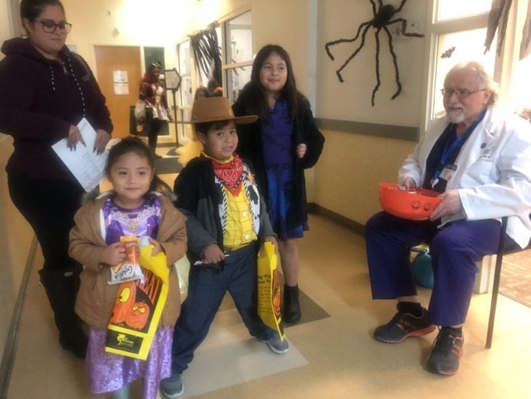 young kids dressed up for halloween