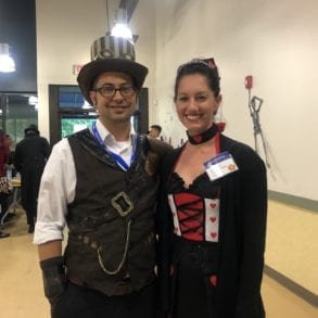 two people in halloween costumes posing