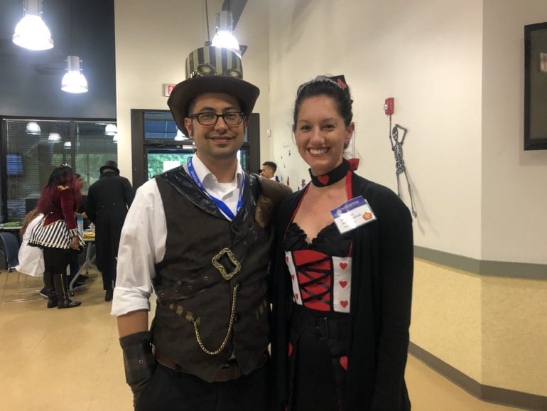 two people in halloween costumes posing