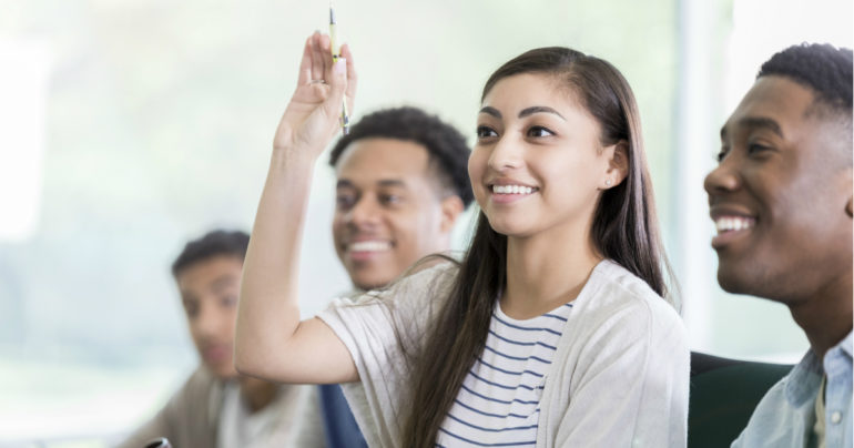 Women raising hand for question, what to know about counseling psychology blog