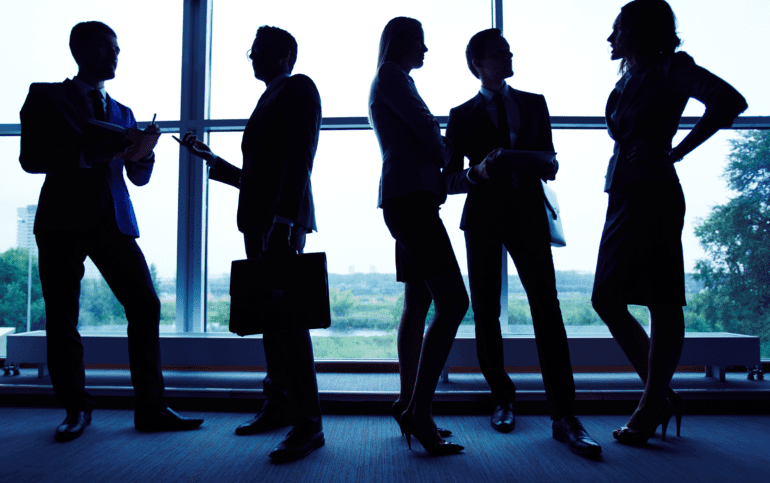 business people standing and talking