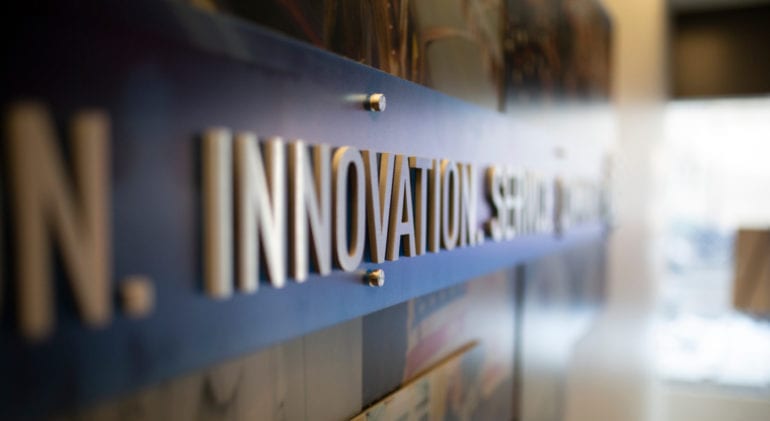 "innovation" on blue sign