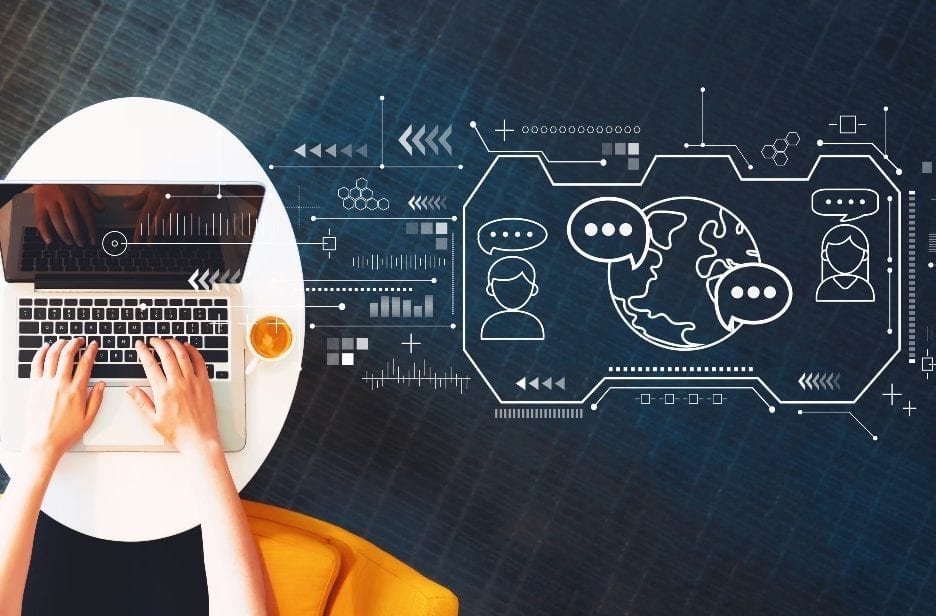 hands typing on computer
