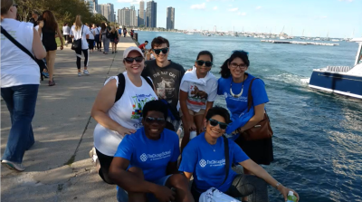 Group of people standing by Chicago lakefront