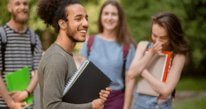 students standing outside smiling