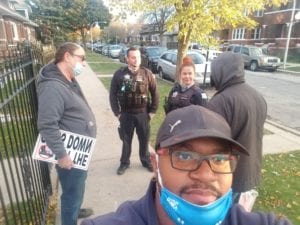 Deondre Rutues and local police officers