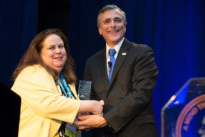Kate Mahoney receiving social work award