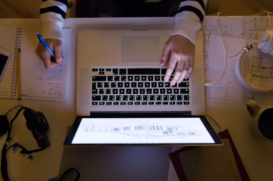 Person sitting at laptop working
