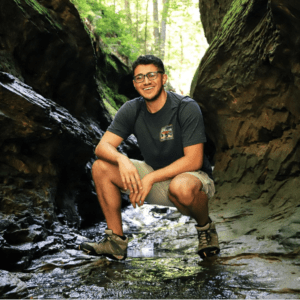 Laith Higazin kneeling